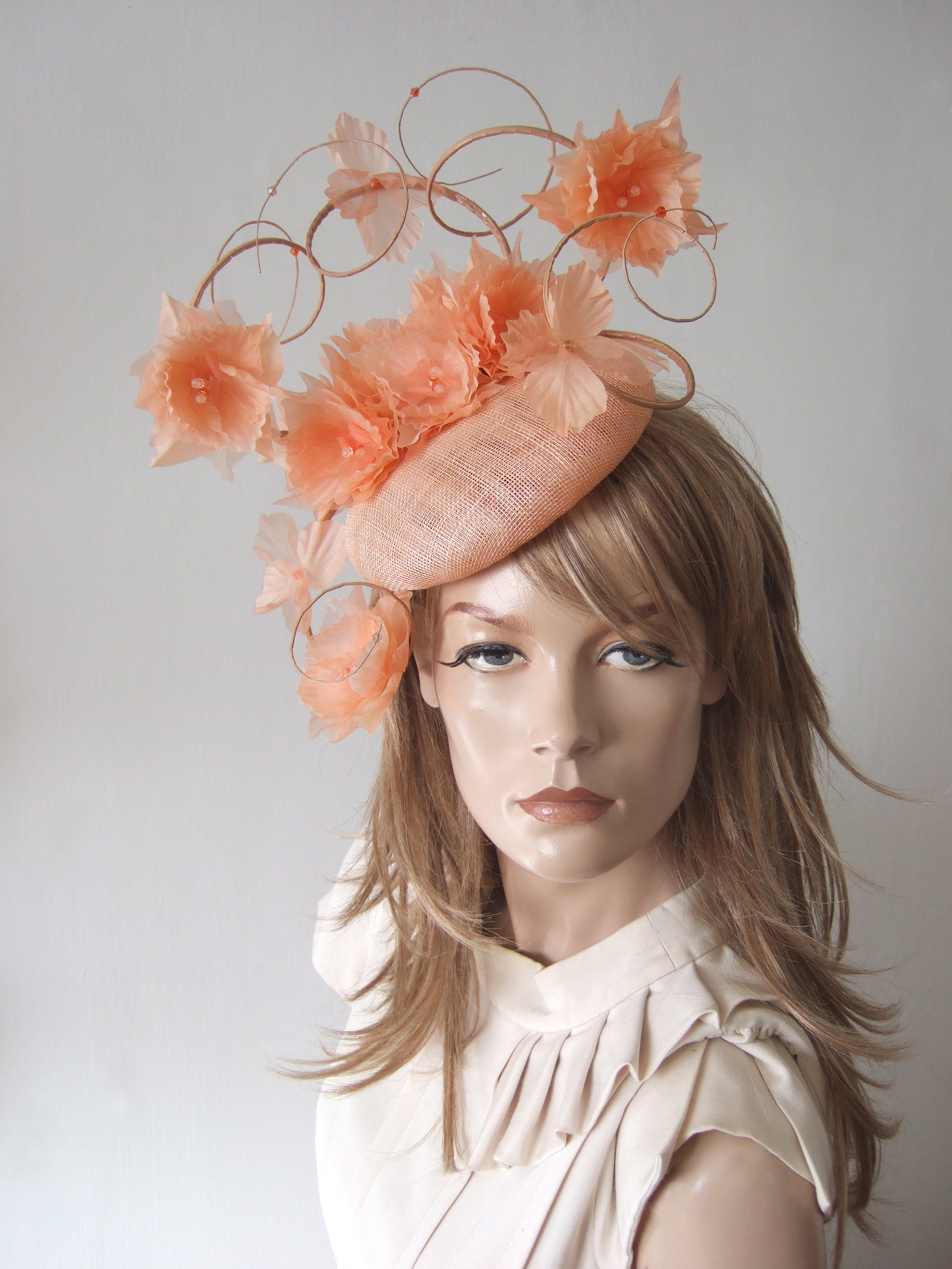 Peach Formal Wedding Guest Hats 2026. Peach Floral Hats for Royal Ascot 2026. Peach Ladies Formal Hats, Formal Hat Hire 2026. Hat Hire Berkshire. Wedding guest hats 2026. Hats for Hire 2026. Peach Ladies Wedding Hats. Mother of the Bride Hats 2026. Royal Ascot Hat Rental 2024. Wedding Hats for Hire UK 2026. Hire Hats for Epsom Races 2026. Hats for the Races 2026.