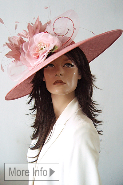 Rose Pink Floral Mother of the Bride Hat. Pink Mother of the Bride Hat Hire. Large Pink Hats for Royal Ascot. Large Pink Hats for Mother of the Bride 2026. Modern Mother of the Bride Hats. Royal Ascot Hats for Hire 2026. Hat Hire for Royal Ascot.