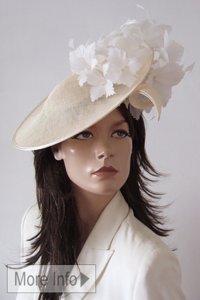 Ivory and White Floral Fascinators. Ivory White Saucer Hats. Ivory White Mother of the Bride Hatinator. Ivory White Ladies Hats for Hire. What to wear to Royal Ascot 2026. Hats for the Grand National 2026. Ivory Mother of the Bride Hats for Hire 2026. Ivory Hire Hats for Royal Ascot 2026.
