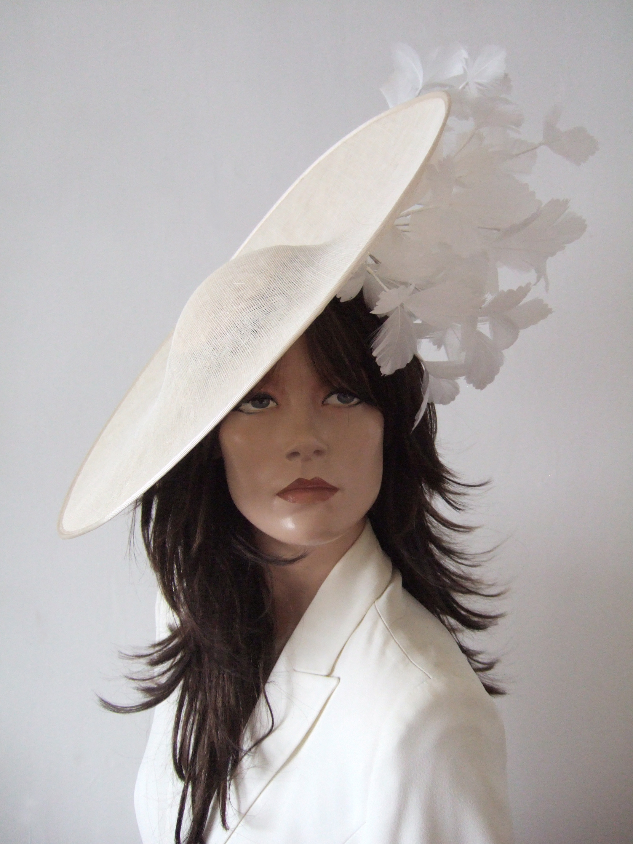 Designer Hats for Hire London. Ivory Royal Ascot Hats. Ivory Mother of the Bride Hats 2026. Hats for Wedding Guests UK. Best Royal Ascot Hats 2026. Designer Hat for Hire 2026. Rent Hats for Royal Ascot 2026. Wedding Hats for Hire UK 2026. Ivory White Hats for the Races. Ivory White Mother of the Bride Hat Hire 2026. Ivory White Wedding Hats.
