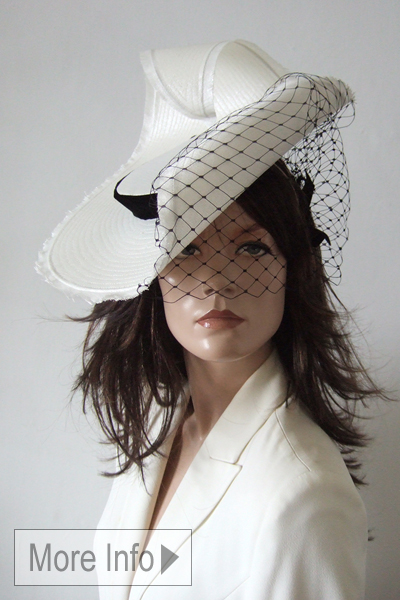 Black White Stephen Jones Hat. Fun Black and White Hats for Royal Ascot 2026. Black and White Ascot Hat 2026. Unusual Hats for Royal Ascot 2026. Hat Hire for Royal Ascot 2026. Black and White Royal Ascot Hats 2026. Stephen Jones Designer Hats. Designer Hats for Royal Ascot Races 2026.