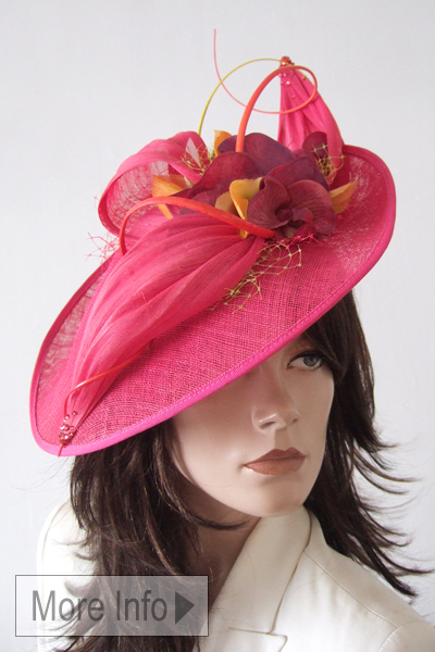 Vivien Sheriff Hat for Hire. Bright Pink Mother of the Bride Hat. Mother of the Bride Designer Hatinators 2026. Royal Ascot Hat Hire. Bright Pink Hats for Royal Ascot 2026. London Hat Hire, Ladies Hat Hire online. Mother of the Bride Hat hire online. Pink Wedding Hats for Hire. Pink Hatinator Hats 2026, Pink Hats for Weddings.