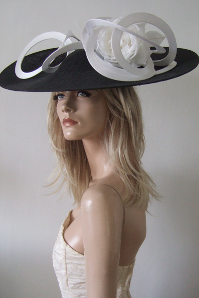 Black and White Philip Treacy Hat. Large Black and White Hat for Royal Ascot 2027. Philip Treacy Hat Hire 2026, Hats for Epsom Races 2027. Royal Ascot Hats 2027, Big Hats for Grand National. Hats for York Races.